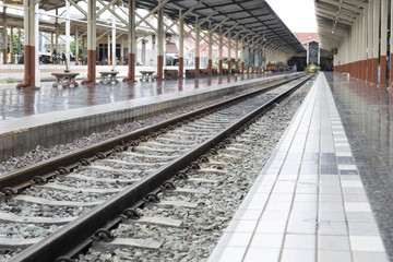 Fototapeta na wymiar platform beside railroad at train station