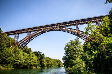 Fototapeta na wymiar iron bridge over the river Adda Lombardia Italy
