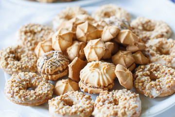 wedding dessert with delicious cookies and different sweets