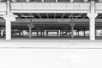 Garage in black and white. Industrial background. Black and white design. Empty garage. Black and white and color. Abstract design and color. Urban geometry. Color splash with black and white.