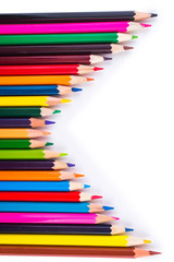 Fototapeta premium Colored pencils isolated on a white background closeup
