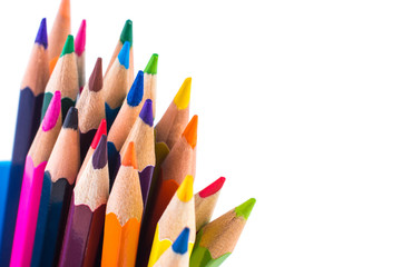 Fototapeta premium Colored pencils isolated on a white background closeup