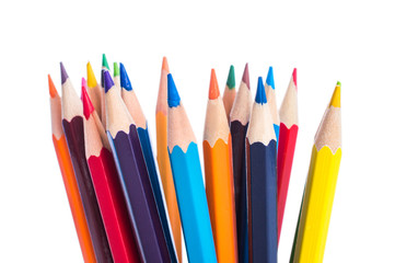 Colored pencils isolated on a white background closeup