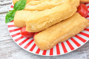 Fried bread stick  on wooden table