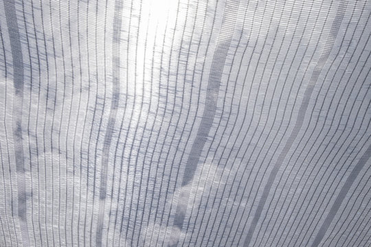 Texture of Shading net with sky as background