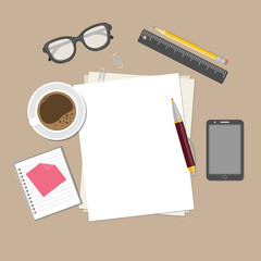 Blank sheets of paper on the desktop. View from above of blank sheets of paper, pen, pencil, ruler, smartphone, glasses, cup of coffee, notepad, paper clips. Preparation for work, notes or sketches.