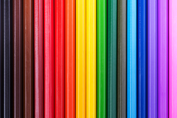 Obraz premium Abstract background of rainbow colored pencils. Top view