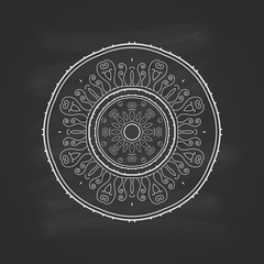 Hand-drawn mandala on the chalkboard background. Lace ornament. Round, circle pattern. Greeting, invitation card. Mehndi and yoga design. Oriental style. Abstract Doodles. Vector illustration