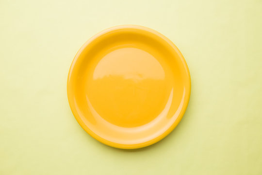 empty yellow plate