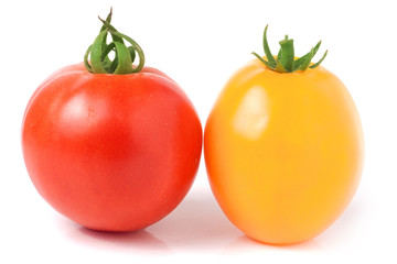 red and yellow tomatoes isolated on a white background