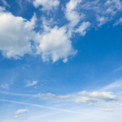 Obraz premium Beautiful cloudscape over horizon. White clouds and blue sky.
