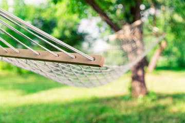 White hammock among the trees