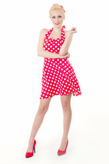 Pin up girl with a vintage red dress 