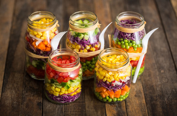 Fototapeta na wymiar Fresh vegetable salad in a mason jar 