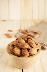 Almond snack fruit in wooden bowl
