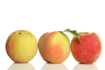 Peach with leaf on white isolated background.