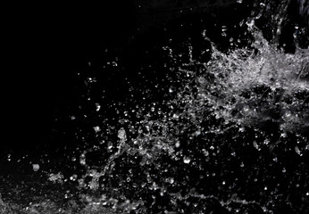 Naklejka premium Water splash on black background