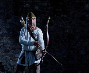 Medieval archer with a bow and arrows