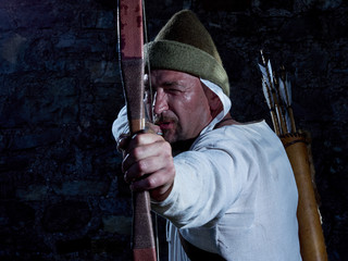 Medieval archer with a bow and arrows