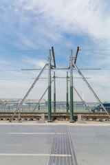 Obraz premium design of metal movable bridge at the junction of its parts. Contact the tram wire.
