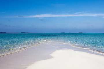 Clear white sand on Maldive island coast