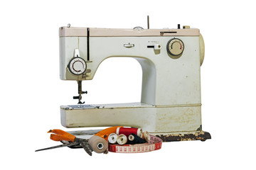 Old Rusty Vintage Sewing Machine with Cotton and Scissors