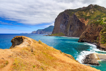 Fototapeta na wymiar Madeira coast - cliffs on the western part of Portuguese island.
