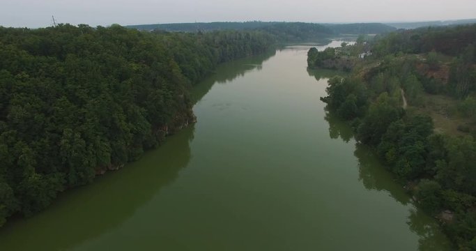 River between the forest shores eastern Europe