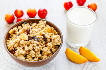 Muesli milk fruit on the table