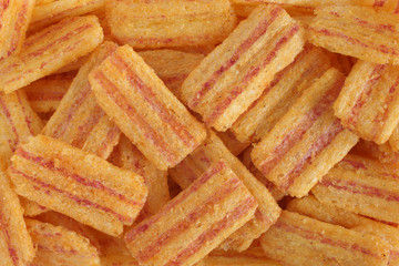 Smoky bacon flavoured maize snacks
