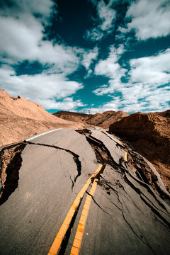 Deep cracks in main road