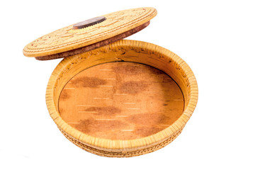 Open casket from birch bark on a white background