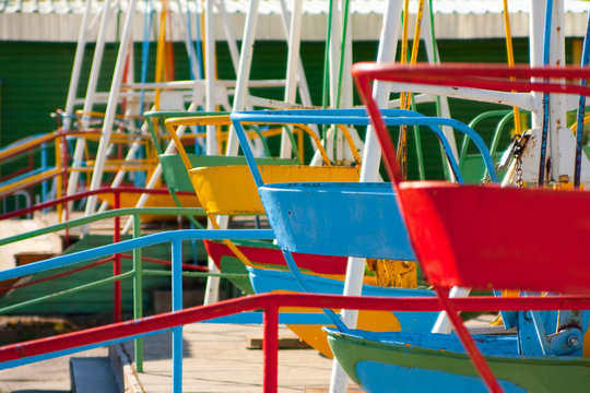 Empty Playground and swings in colorful park, Russia.