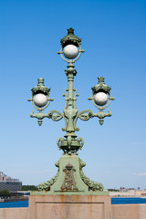 Fototapeta na wymiar Trinity Bridge. Lighting trehrozhkovy lantern. Saint Petersburg Russia.