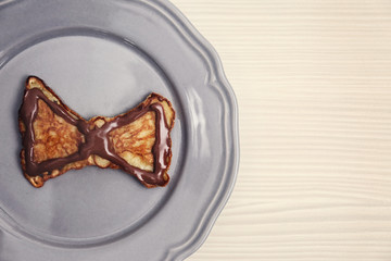 Chocolate pancake on plate. Happy fathers day concept