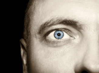 Obraz premium Image of man's vintage eye close up.