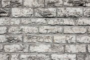 Grunge gray brick wall background.
