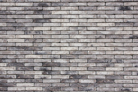 Fototapeta Grunge gray brick wall background.