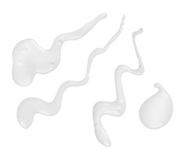 Set of multiple puddles of cosmetic cream isolated on white back