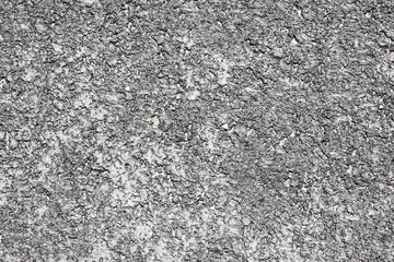 Asphalt grunge gray closeup background.