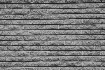 Gray brick wall background.