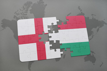 puzzle with the national flag of england and hungary on a world map background.