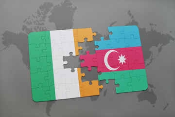 puzzle with the national flag of ireland and azerbaijan on a world map background.