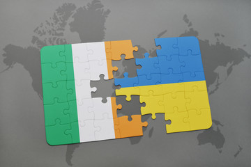 puzzle with the national flag of ireland and ukraine on a world map background.