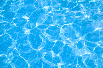 Fototapeta na wymiar Blue water surface and abstract, Water in swimming pool with sun reflection