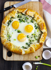 Pie with rice, green onions and egg. Galette