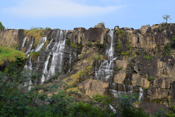 Naklejka premium tropical cascading Pongour waterfall near dalat, vietnam