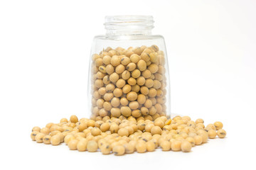 Soybean in glass bottle setup isolated on a white background.