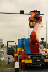 people is working on crane