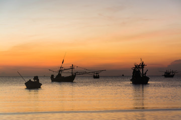 Fototapeta na wymiar Silhouette of fishing boat in thailand